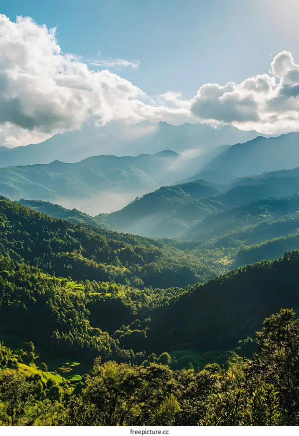 Green Mountains Landscape with Clouds and Sunlight