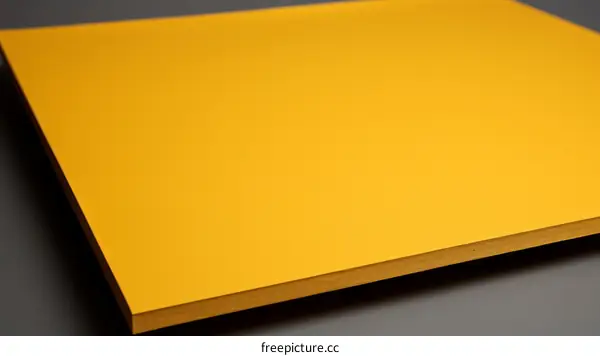 Yellow Fiberboard Texture on Gray Background