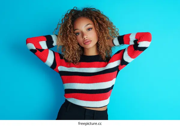 Stylish Woman in Colorful Striped Sweater