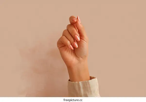 Womans Hand with Elegant Nails