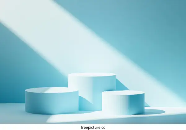 Light Blue Product Showcase with Cylindrical Platforms