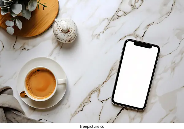 Flat Lay Mockup with Coffee, Smartphone, and Plant on Marble Background