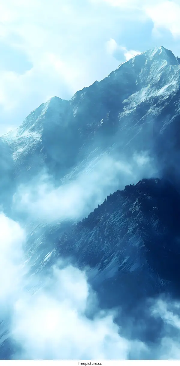 Mountain Range with Clouds and Fog