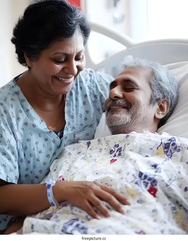 Indian Couple in Hospital Room, Wife Caring for Husband