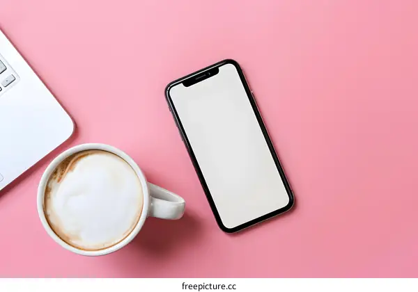 Laptop Smartphone and Coffee on Pink Background