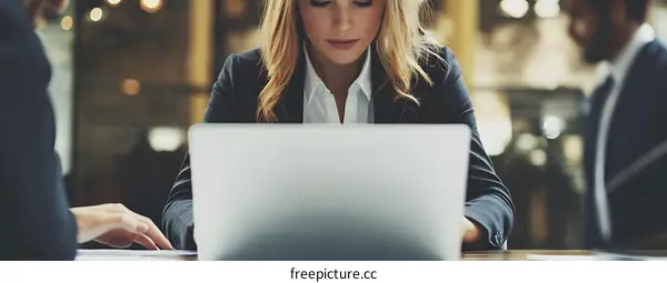 Businesswoman Working on Laptop in Office