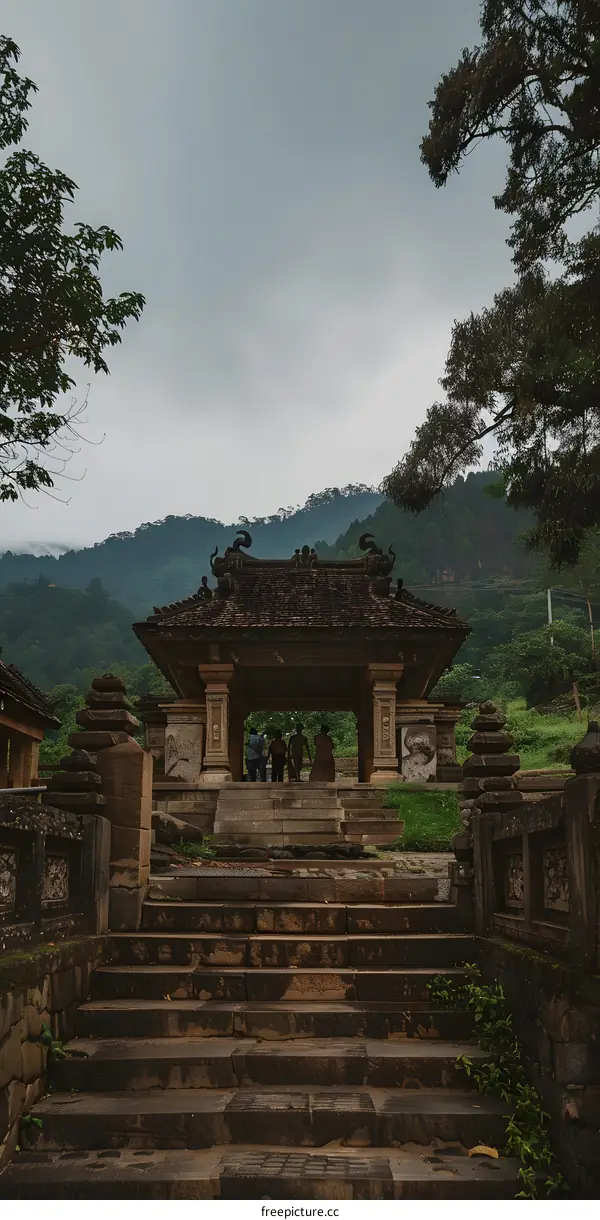 Stone Steps Leading to Ancient Temple in Mountainous Landscape
