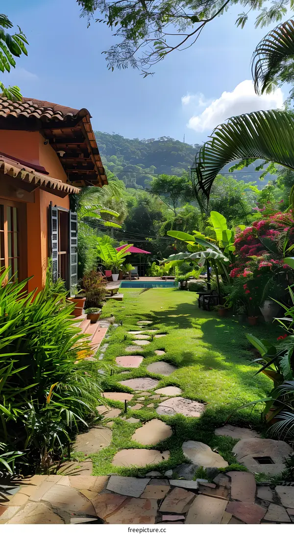 Courtyard with tropical plants and swimming pool
