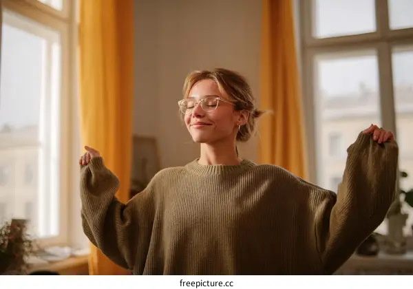 Woman Relaxing by the Window in a Cozy Interior