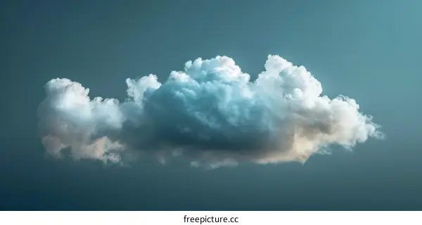 A large white cloud floating in a blue sky