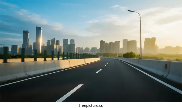 Urban road with modern city skyline in the background