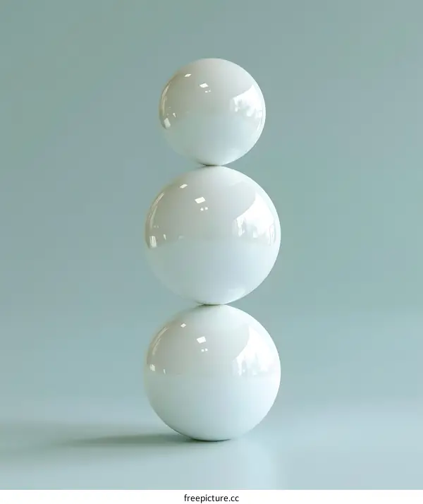 White Spheres Balanced on Top of Each Other