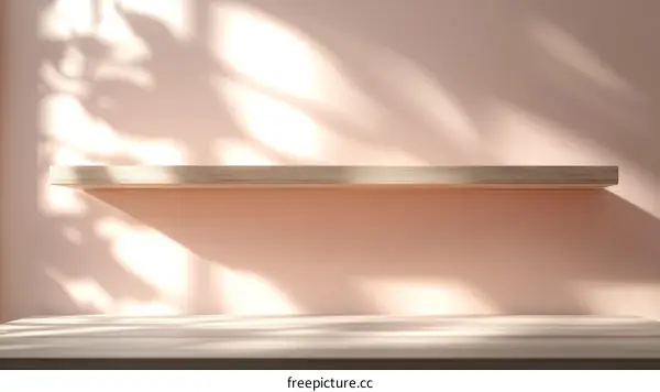 Empty Wooden Shelf Against a Pastel Pink Wall