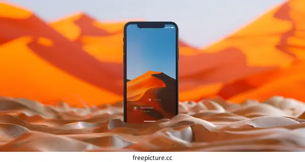 Smartphone on Orange Sand Dunes Desert Landscape Background