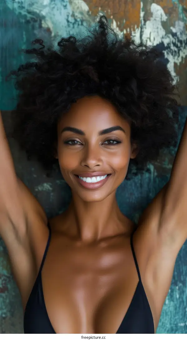 Portrait of a beautiful smiling woman with curly hair