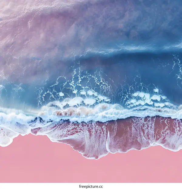 Pink Sand Beach with Blue Ocean Waves from Above