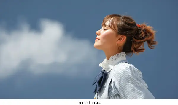 Woman Outdoors Enjoying the Sky with Clouds