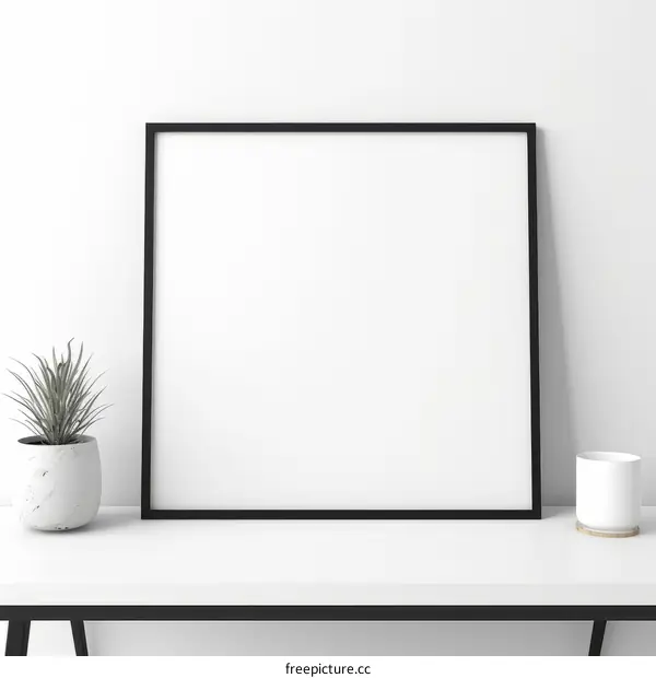 Minimalist Black Picture Frame Mockup on White Table