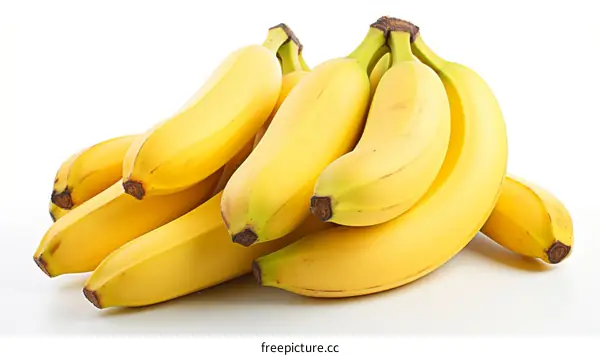 A bunch of yellow bananas isolated on a white background