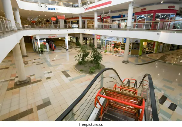 Empty Shopping Mall Interior with Escalator