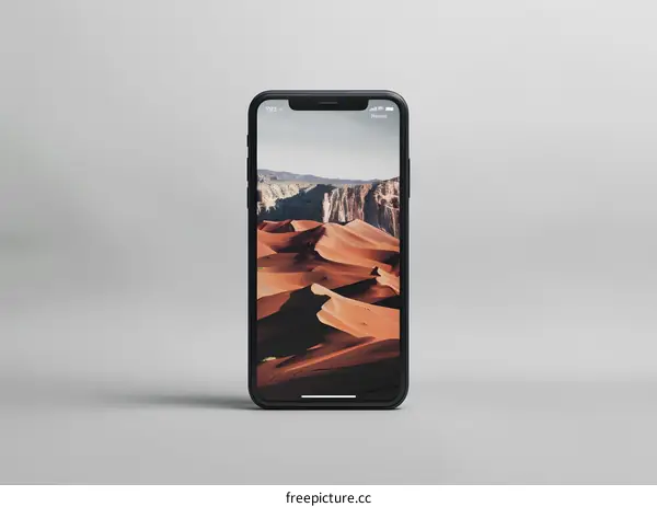 Black Smartphone with Desert Landscape Wallpaper