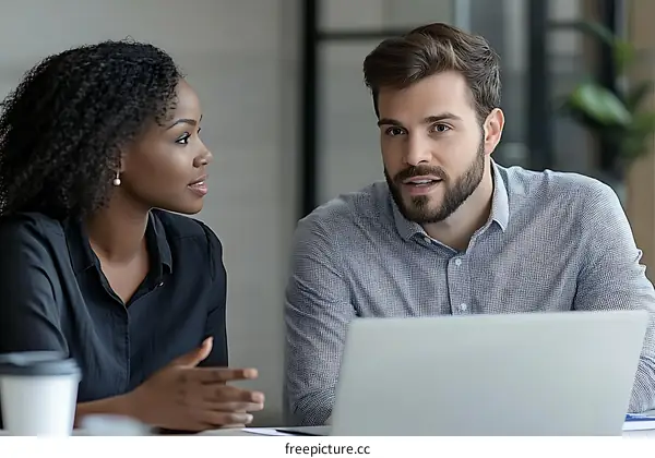 Business Colleagues Discussing Ideas in Office