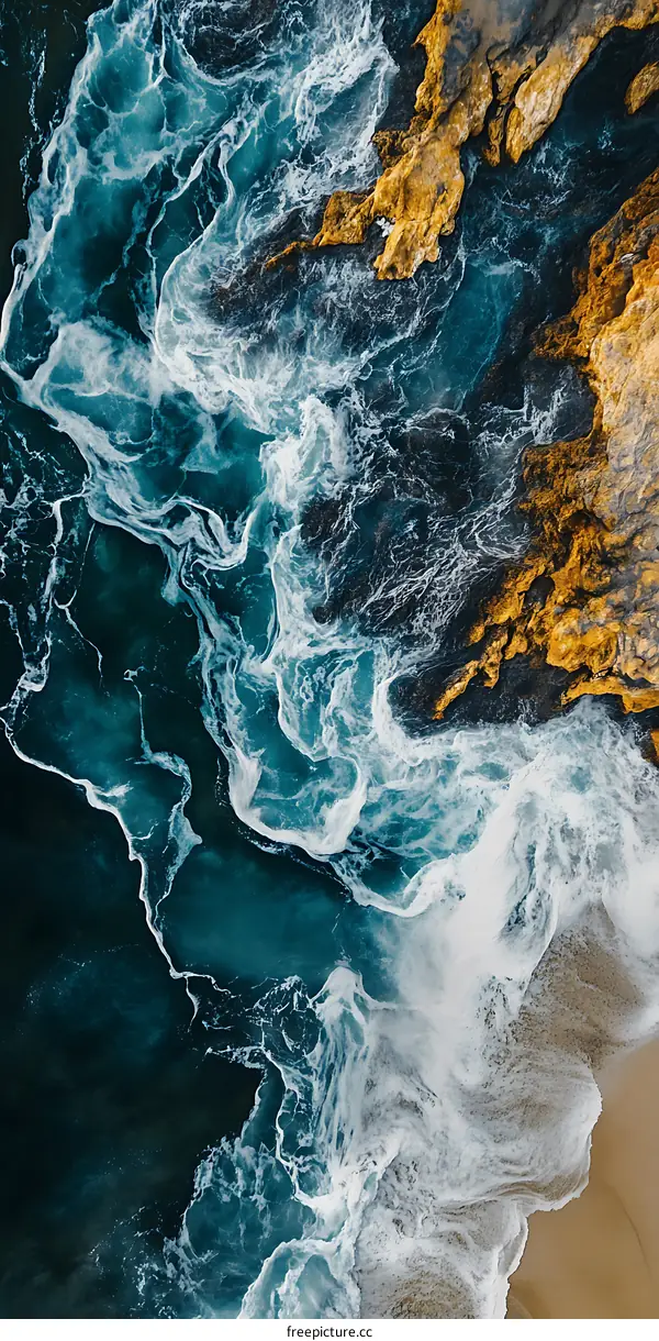 Aerial View of Waves Crashing on a Coastline