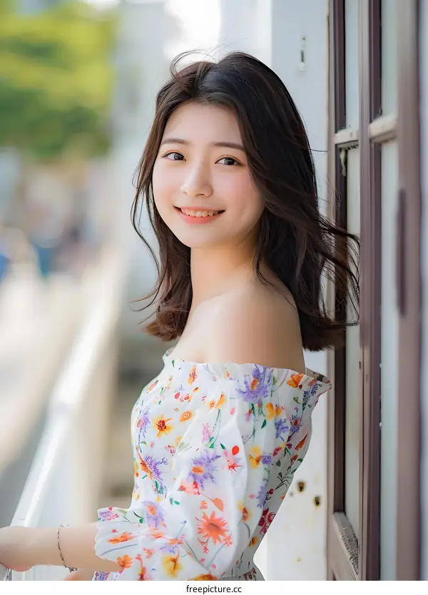 Smiling Asian Woman in Floral Dress Posing by Window