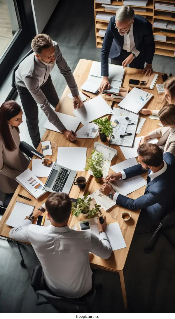 Colleagues discussing new project ideas in modern office space