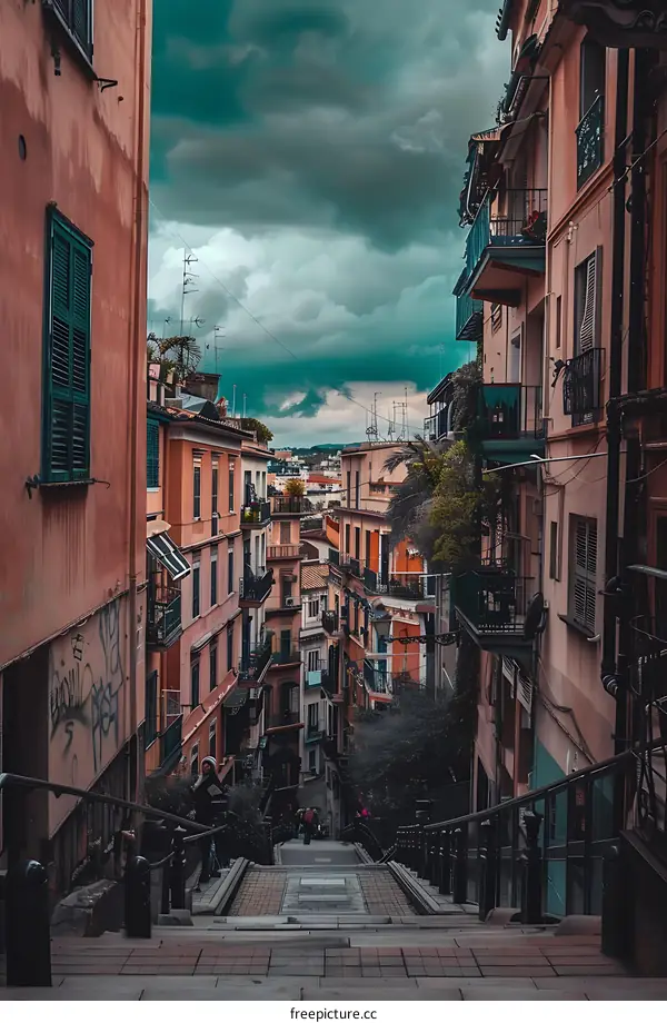 Narrow Street with Stairway and People in European City
