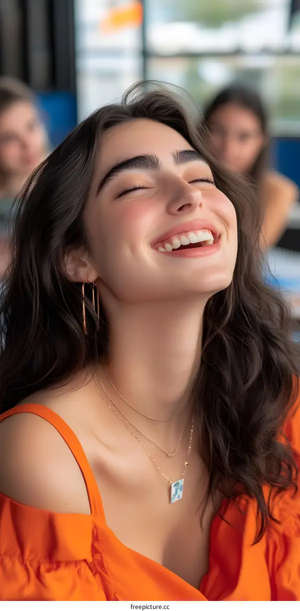 Portrait of a Smiling Woman with Long Brown Hair