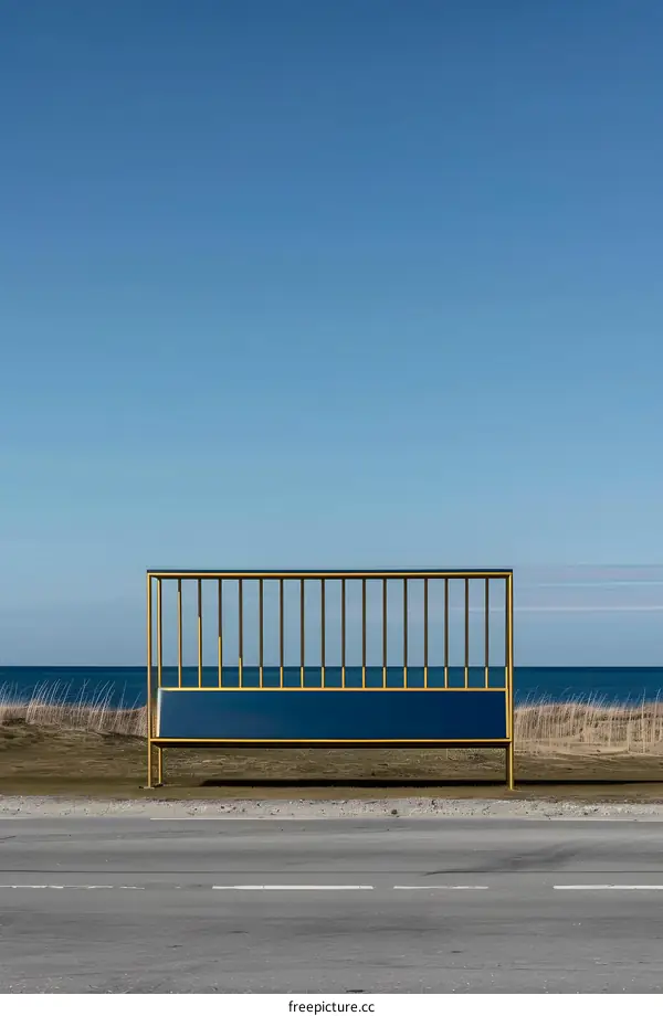 Yellow Metal Fence on Coastal Road