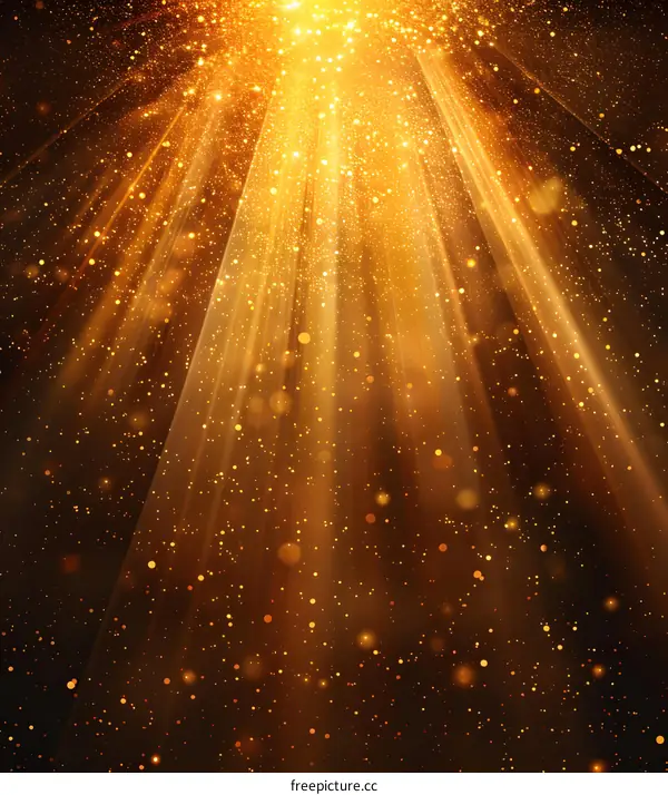 Golden glitter sparkles on black background