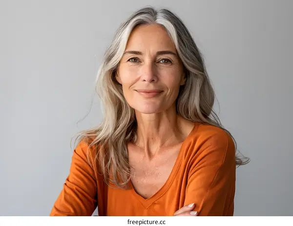 portrait of a smiling mature woman with gray hair