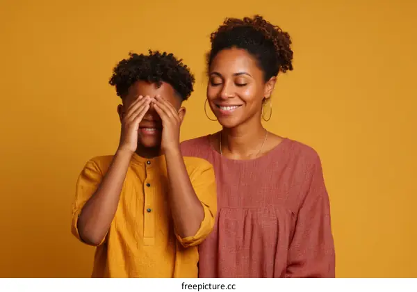 Mother and Child Hiding Eyes Playful Portrait