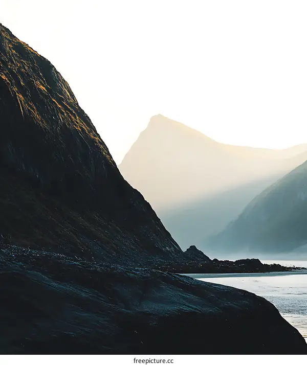 Mountain Landscape with Foggy Peaks at Dawn