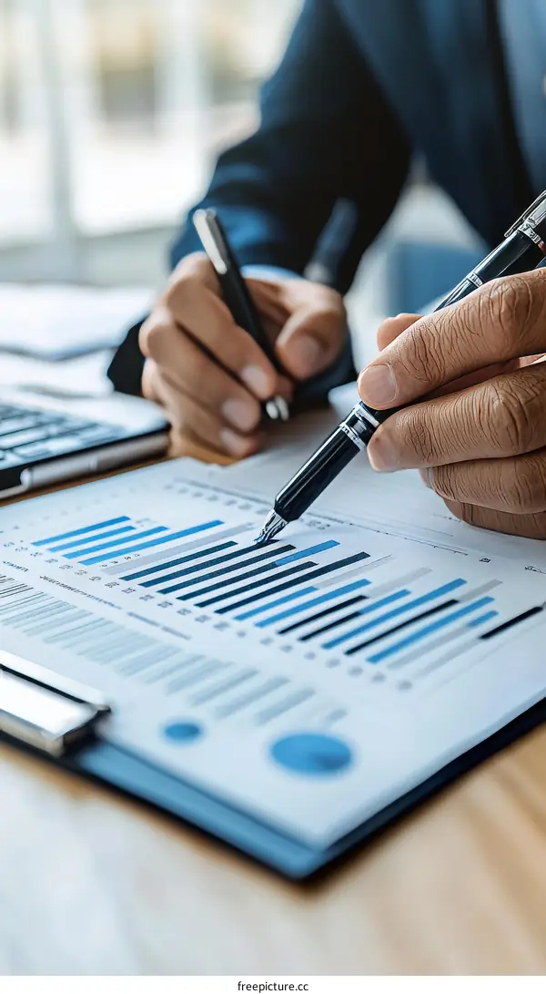 Businessman Analyzing Financial Charts