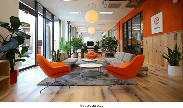 Modern Office Space with Orange Chairs