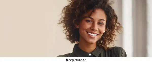 Smiling Woman with Curly Hair Portrait