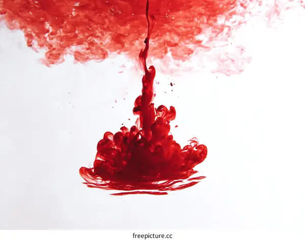 Red Ink Blot in Abstract Watercolor