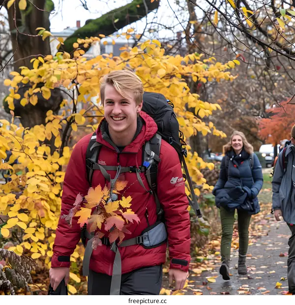 Smiling Man With Backpack Walking In Autumn Forest