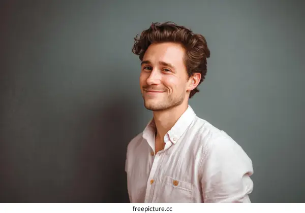 Portrait of a Smiling Man in a White Shirt