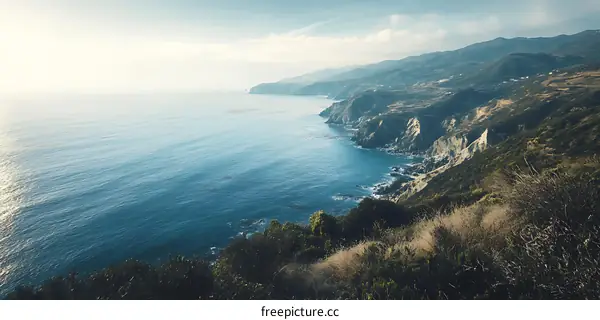Aerial View of a Coastline with Cliffs and Blue Ocean