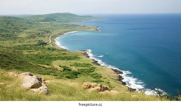 Coastal Landscape with Lush Hills and Azure Sea
