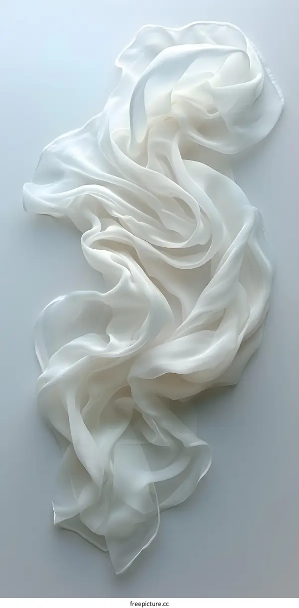 White Fabric Draped On A White Background