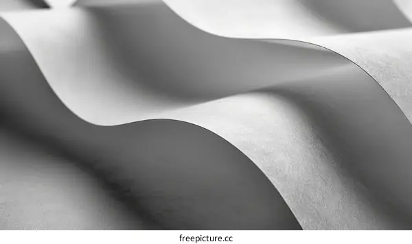 grayscale image of a flowing white cloth