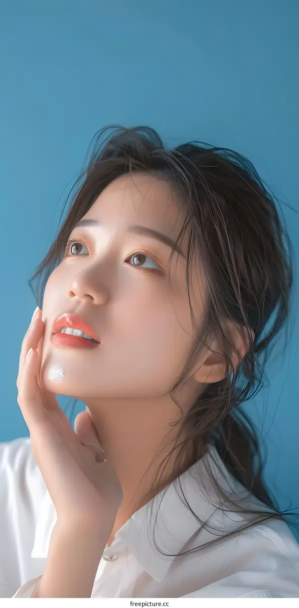 Portrait of a Young Woman with White Shirt