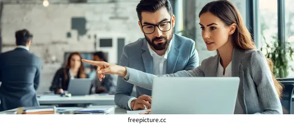 Business Professionals Working Together in a Modern Office