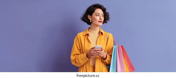 Woman Shopping with Colorful Bags and Phone