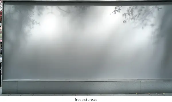 Blank Advertisement Billboard with Shadowed Branches